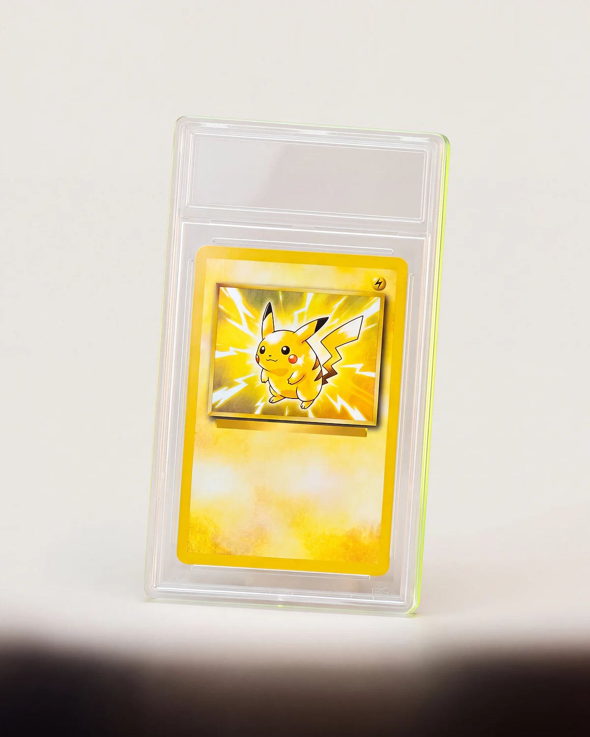 Graded holographic Pikachu trading card